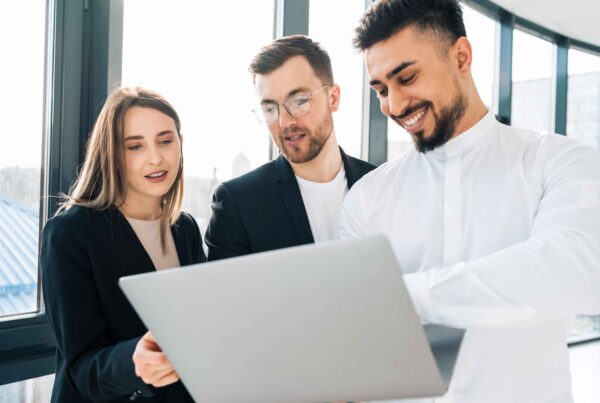 Business owner or finance team reviewing a laptop with accounting software open