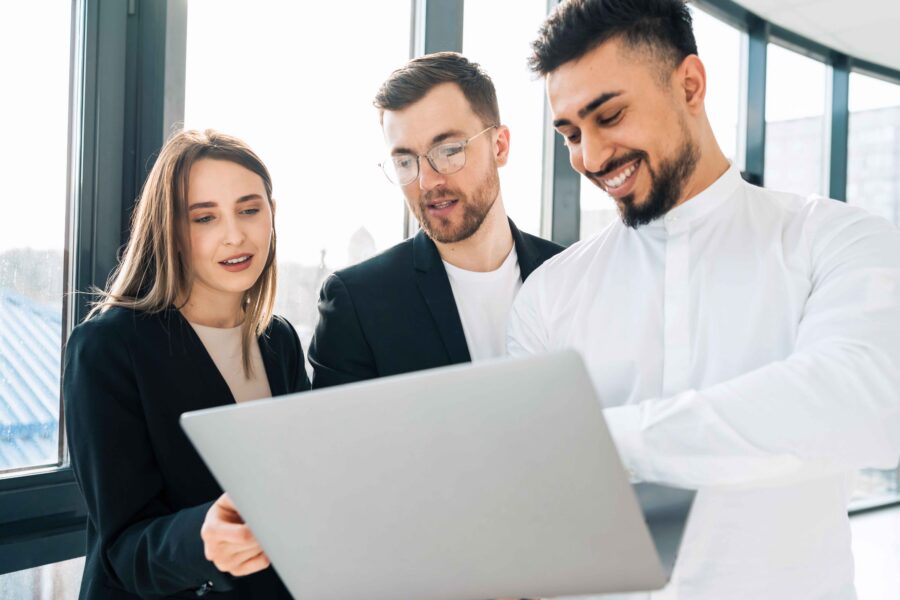 Business owner or finance team reviewing a laptop with accounting software open